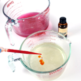 Adding the Vetyver Fragrance to the melted wax