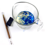 Step one: Melt down the wax and add som shavings of the Blue dye block