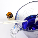 Adding the Vetyver Fragrance to the melted wax